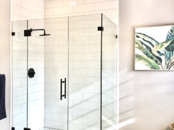 Frameless Panel-Door-Panel-Return with Matte Black Hardware